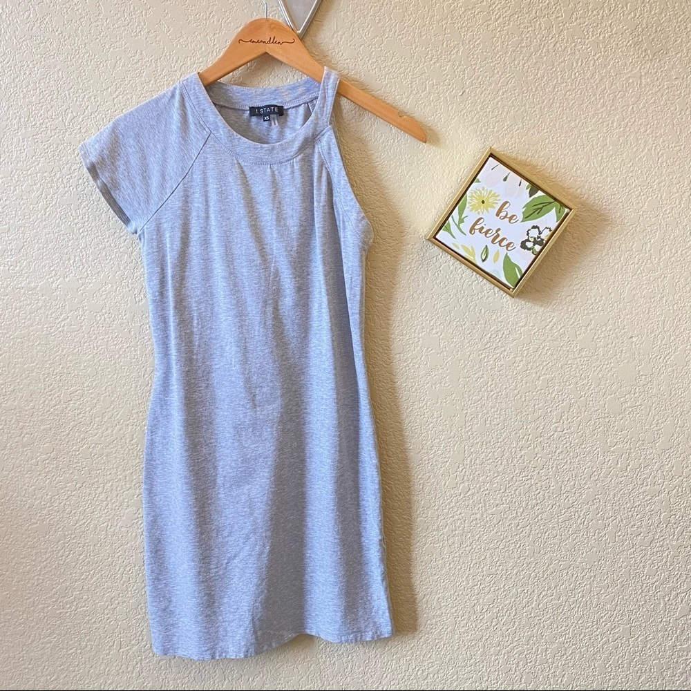 1. State one sleeve grey dress